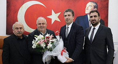 Erhan Güzel'den Üner'e nezaket ziyareti